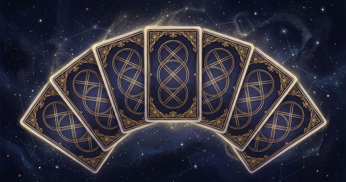 A gracefully fanned arc of seven identical tarot card backs, each rendered in ornate gold-leaf filigree on deep indigo, set against a midnight-indigo cosmic backdrop with quiet stars and soft golden particle dust.